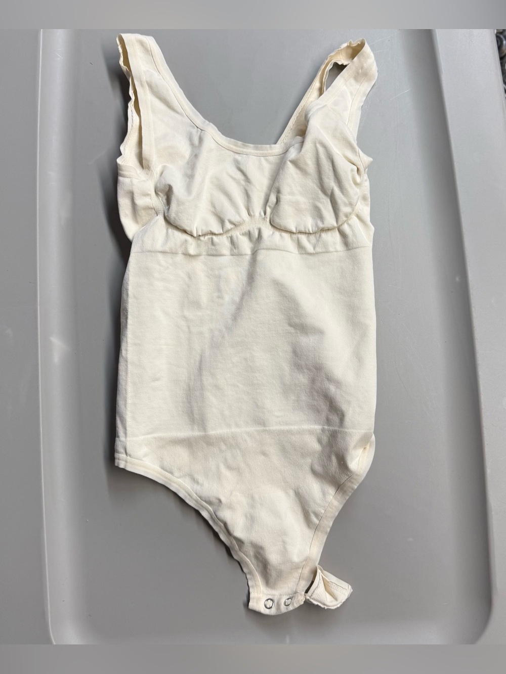 Cream One-Piece Bodysuit